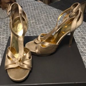 Gold strapped high heels